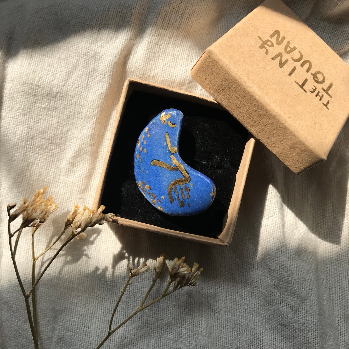 Ceramic Blue sleeping sighthound pin with 24 Karat Gold